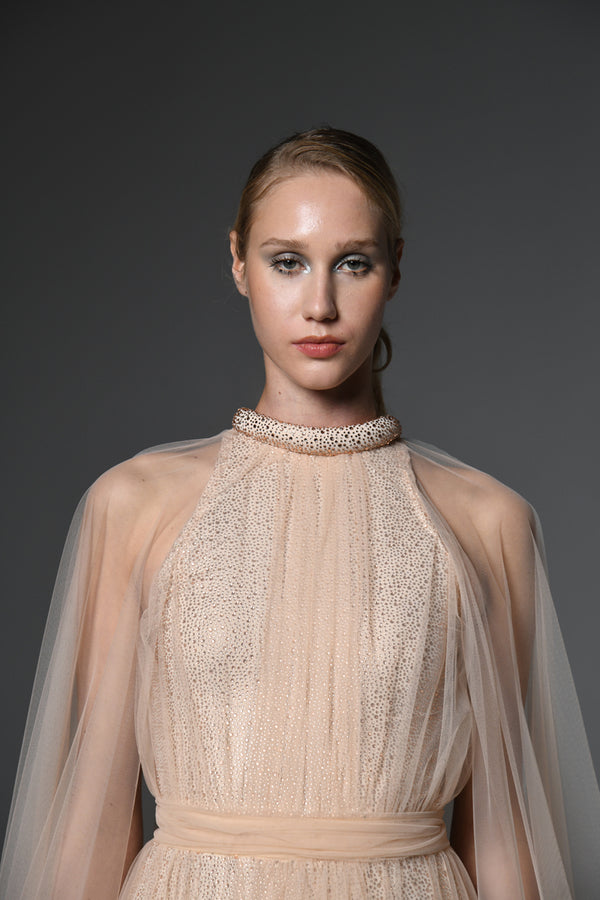Peach crystal studded dress layered with tulle