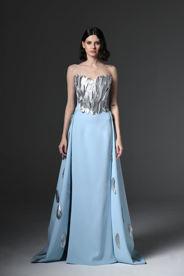Light blue crêpe dress with feathers on bustier