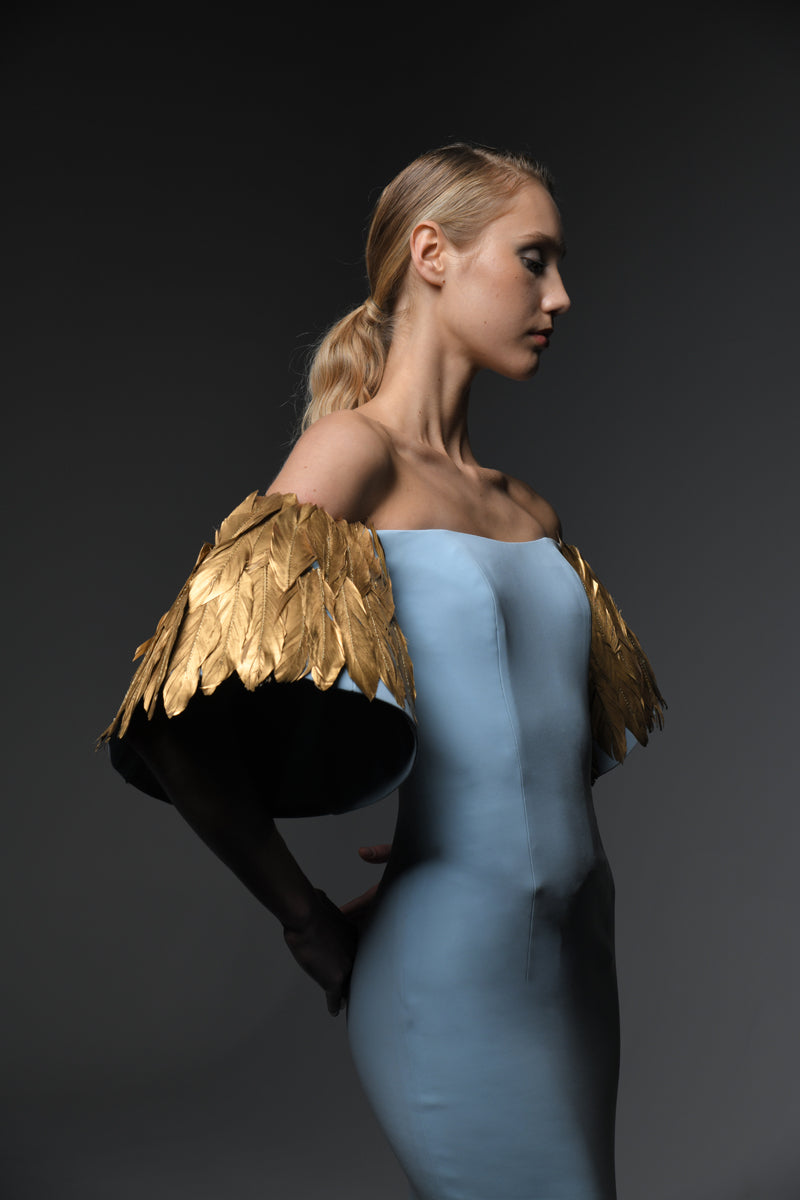  Light blue crêpe dress with feathers on sleeves