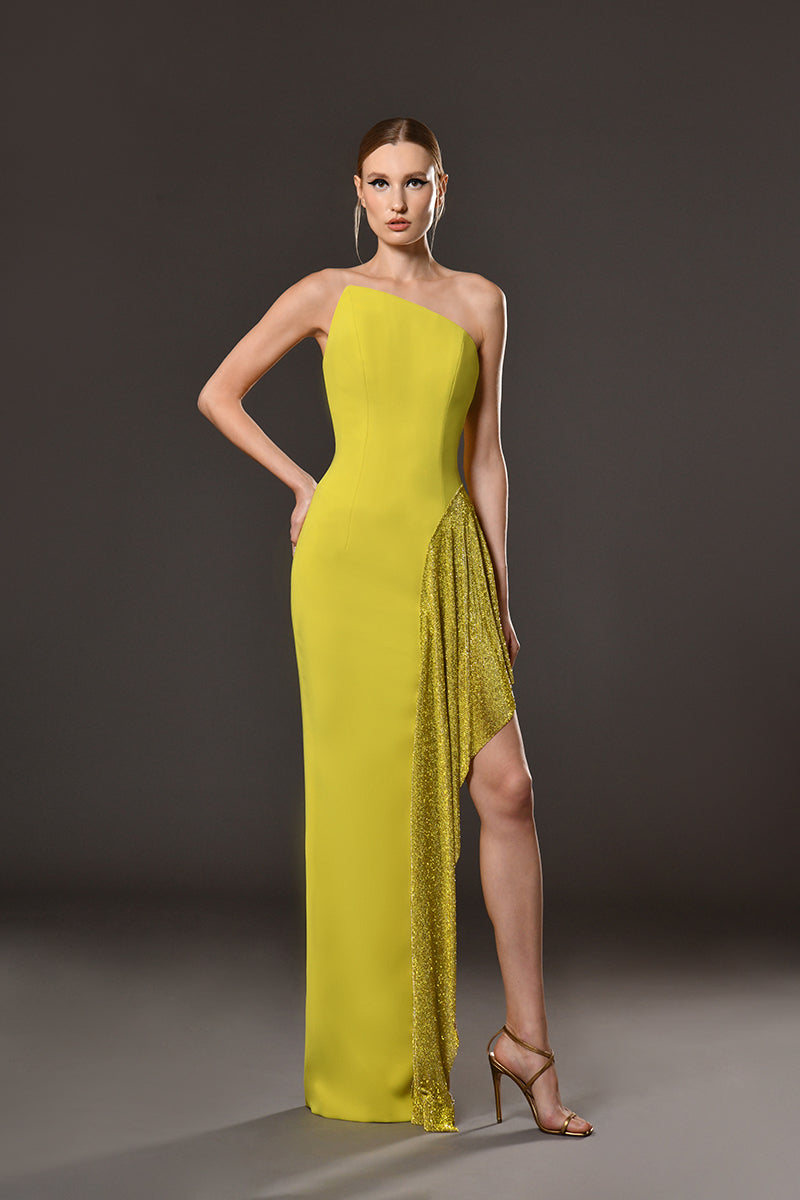Strapless Asymmetrical lime yellow crêpe dress with rhinestones chainmail on side slit