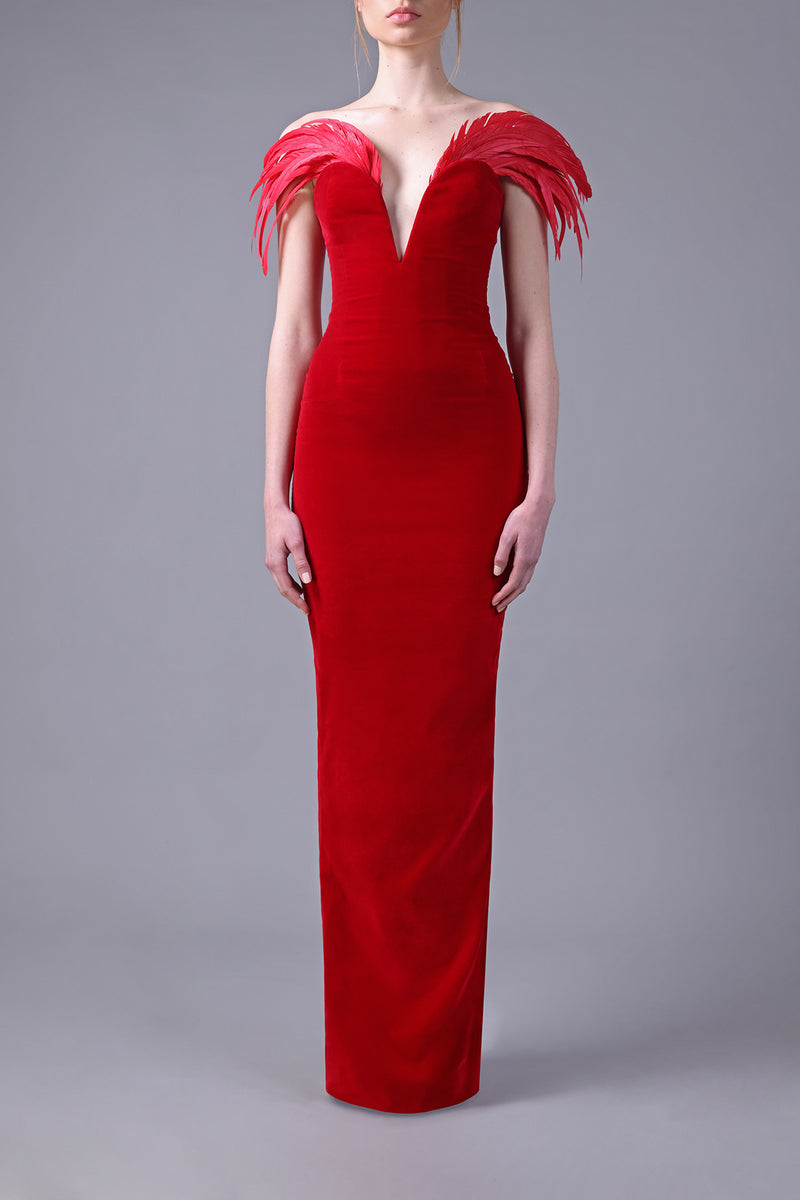 Fitted strapless deep red velvet dress with feathers