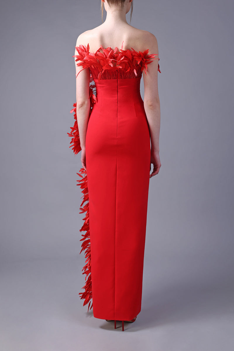 Asymmetrical red crêpe dress with feathers