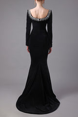 Black velvet dress with crystals embroidered neckline and floor sweeping train