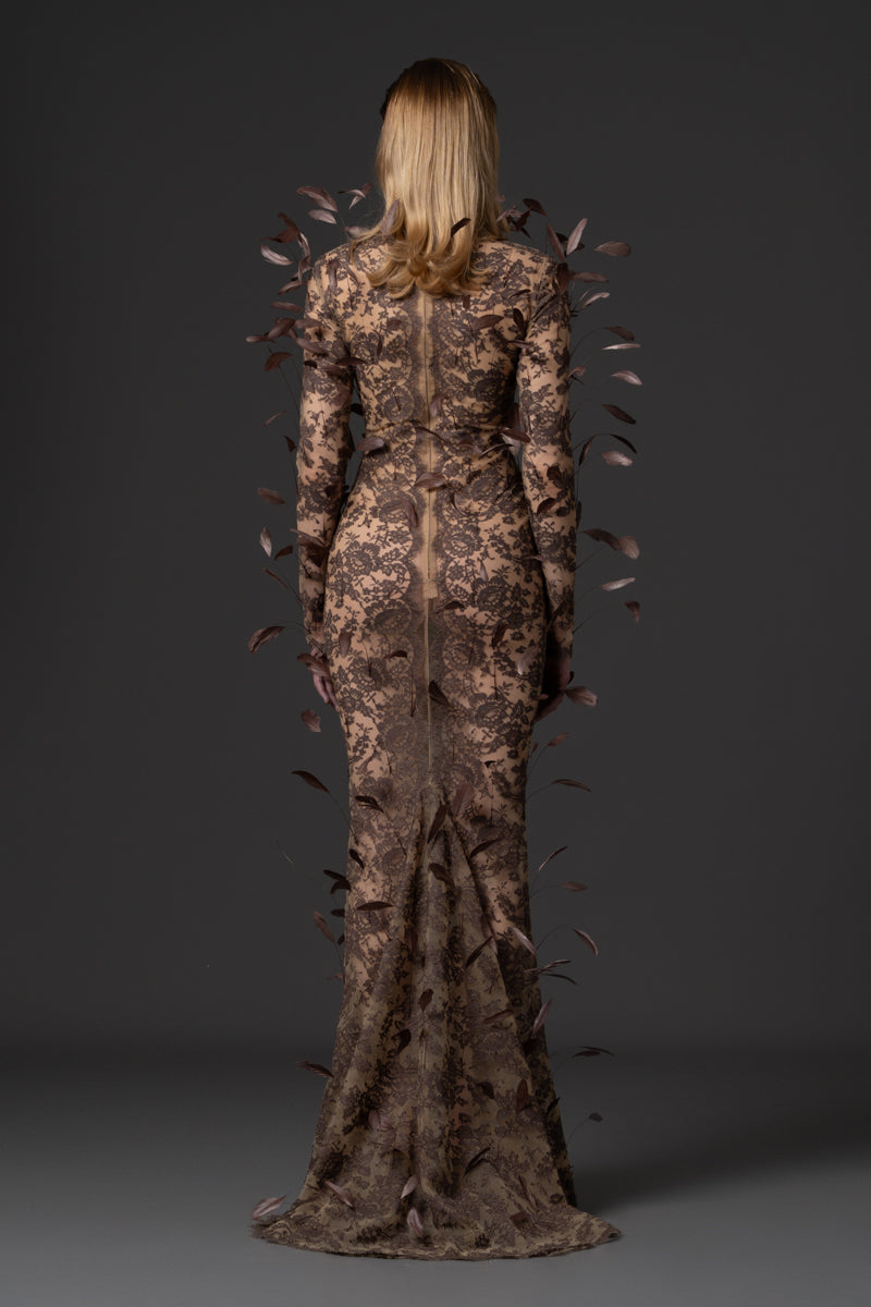 A mermaid long sleeves lace dress with feathers