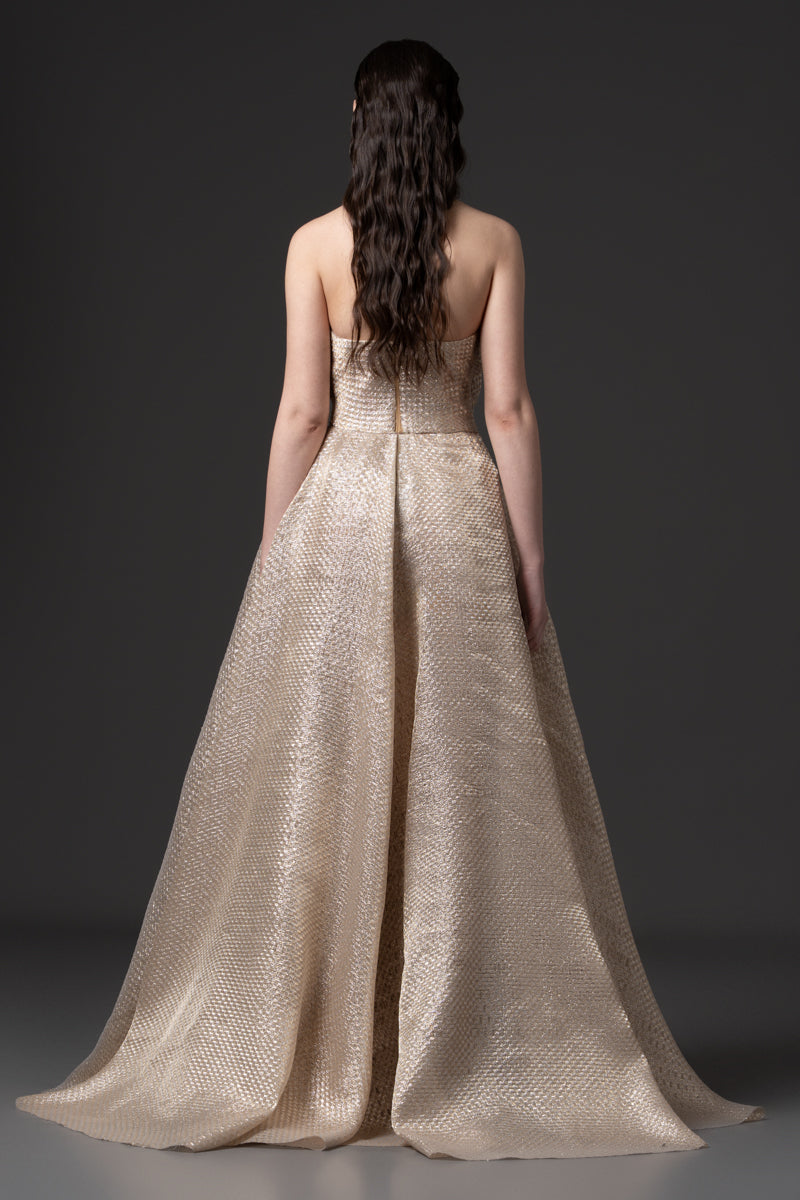 A pleated A-line Jacquard gown