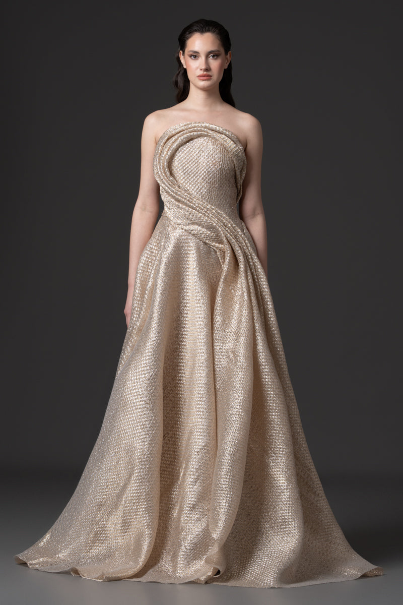 A pleated A-line Jacquard gown