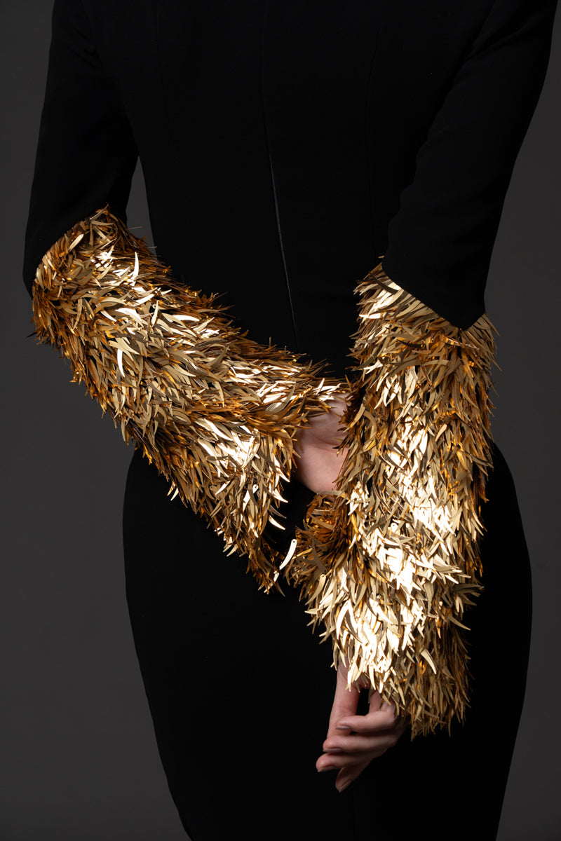 Black crêpe long-sleeve dress, featuring gold spike embroidery
