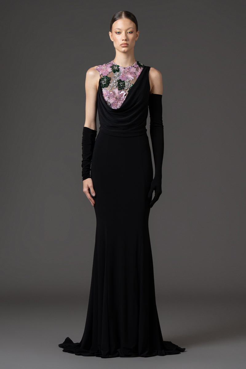 Black jersey dress with gloves, featuring floral embroidery on the bodice