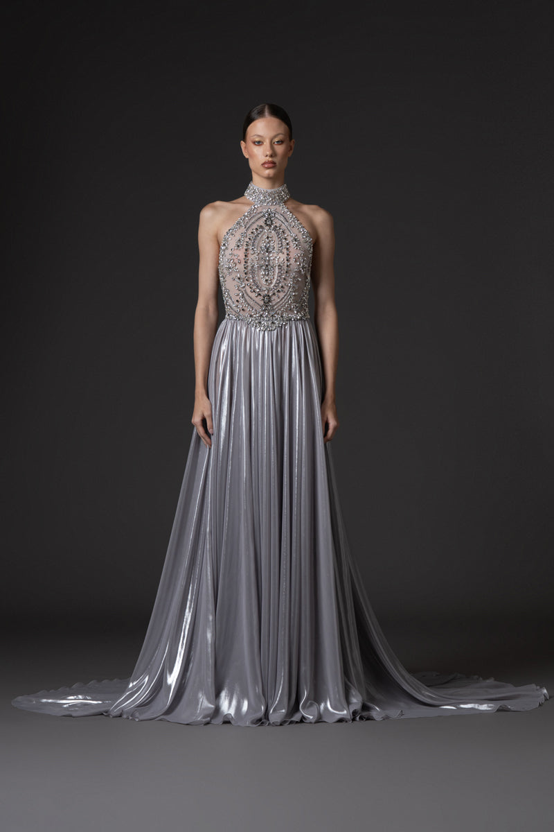 Halter neck dress in flowing silver chiffon lamé, featuring a crystal  embroidered bodice.