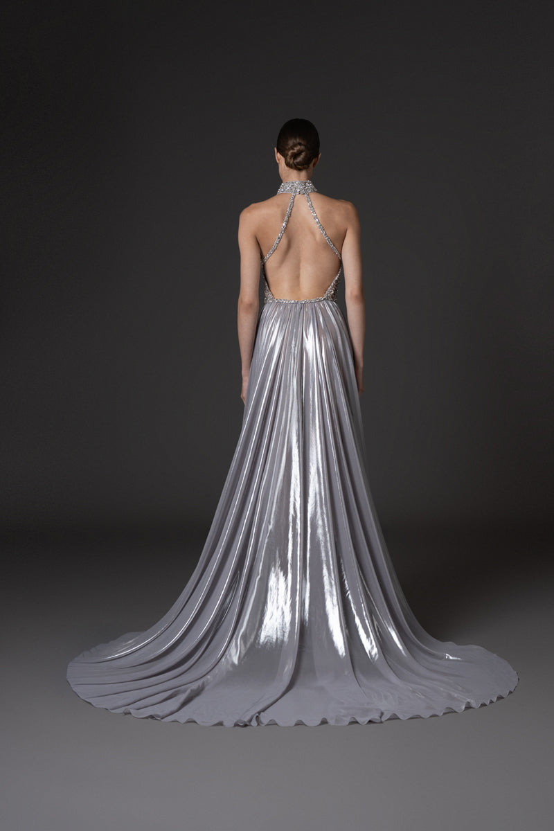 Halter neck dress in flowing silver chiffon lamé, featuring a crystal  embroidered bodice.
