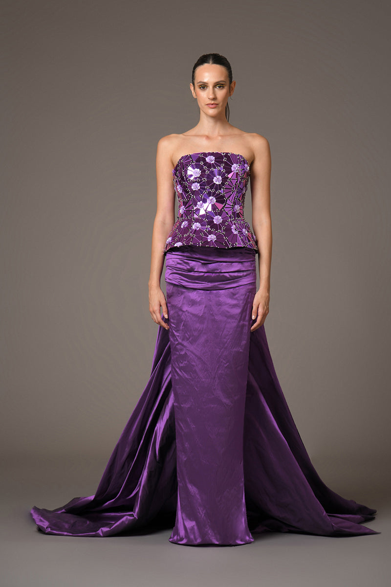 Purple Corset with intricate floral patterns embroidered with mirror plexiglass paired with a draped taffeta skirt