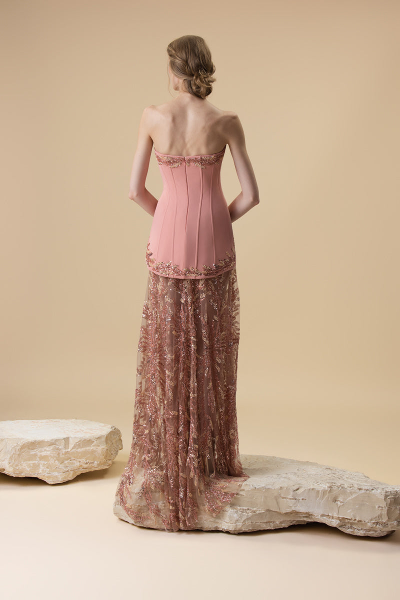 A two-piece ensemble featuring a crepe strapless short dress and a floor-length A-line tulle fully beaded skirt.
