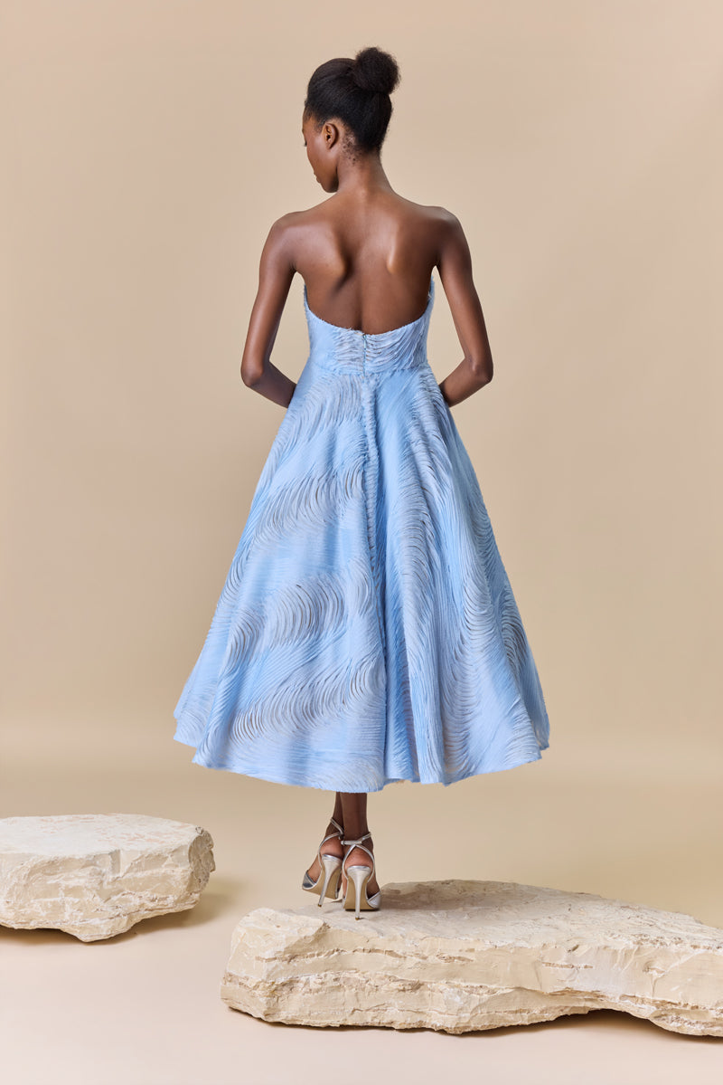 A shredded chiffon strapless midi A-line dress featuring a sweetheart neckline.
