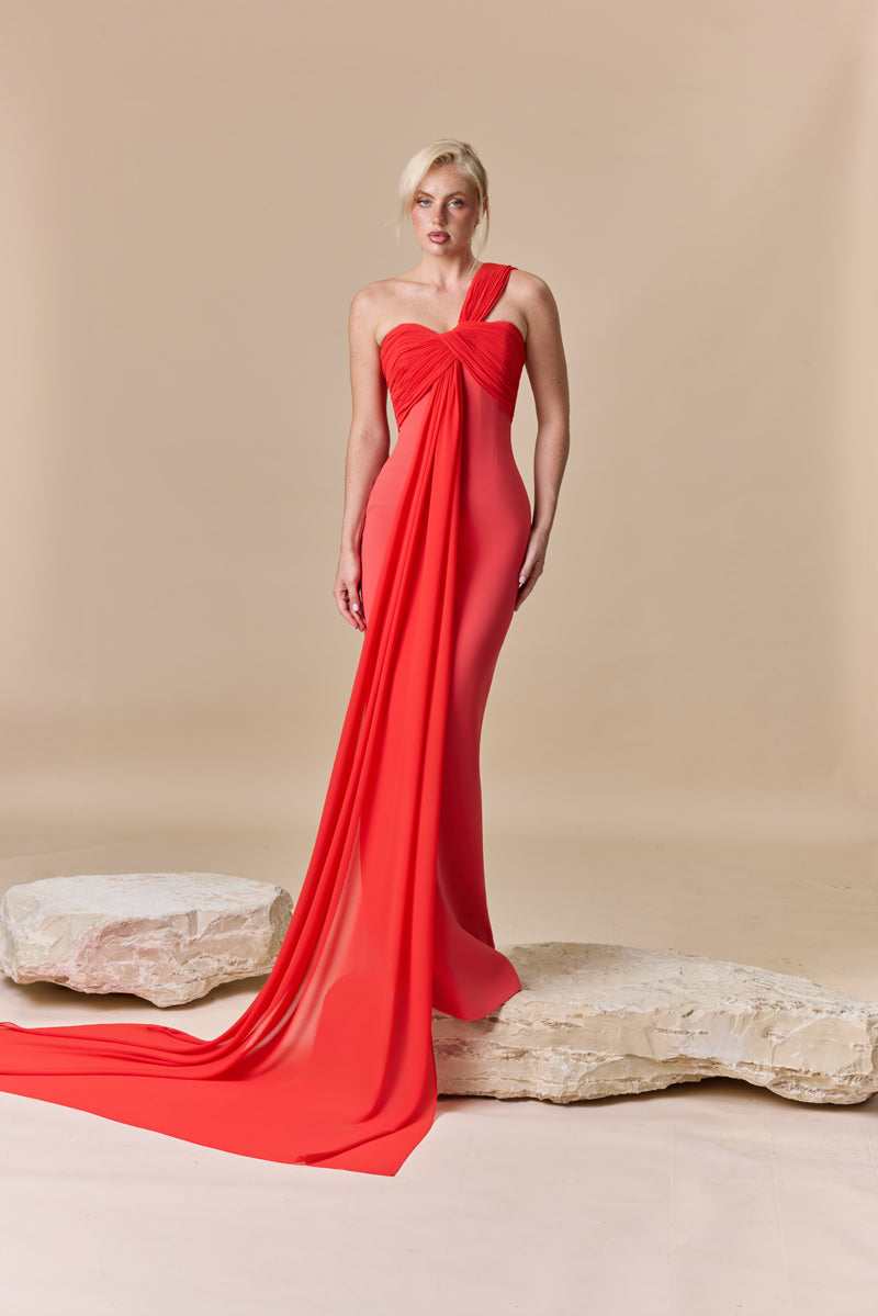 A fitted crepe dress with an asymmetric draped georgette neckline.