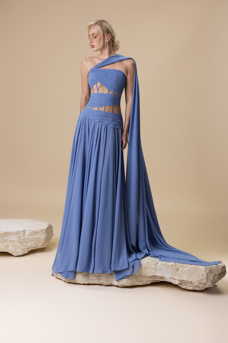 A strapless georgette A line dress with horizontal drapes across the bodice, and a soft flowing floor-length skirt.