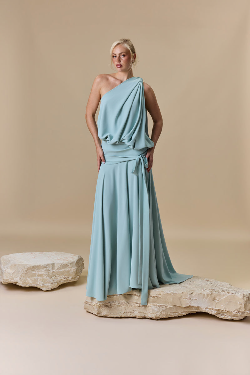 A crêpe asymmetrical one shoulder puffed dress with A-line skirt.