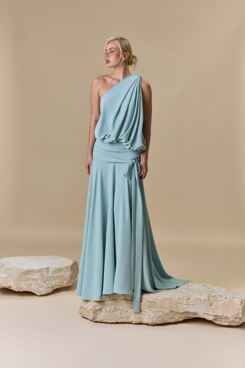 A crêpe asymmetrical one shoulder puffed dress with A-line skirt.