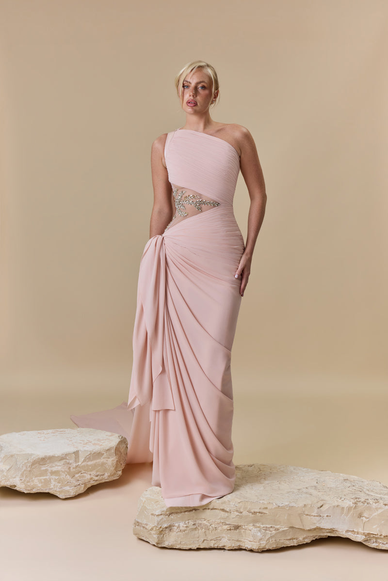 A draped one-shoulder georgette gown with asymmetric draping and a beaded waist embellished with crystals and stones.