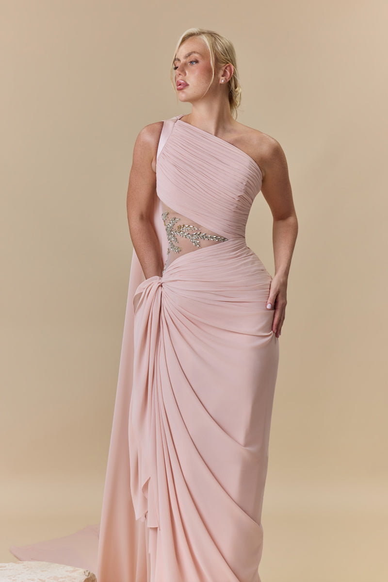 A draped one-shoulder georgette gown with asymmetric draping and a beaded waist embellished with crystals and stones.