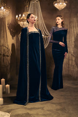 Asymmetric velvet blue dress with tulle and crystal embroidery