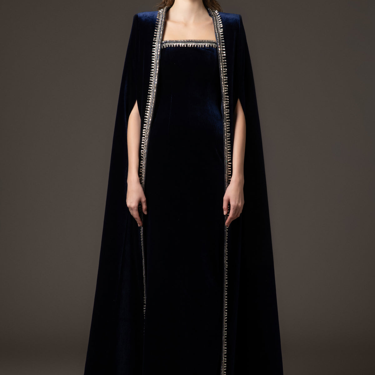 Embroidered velvet blue dress paired with a cape Embroidered velvet blue dress paired with a cape