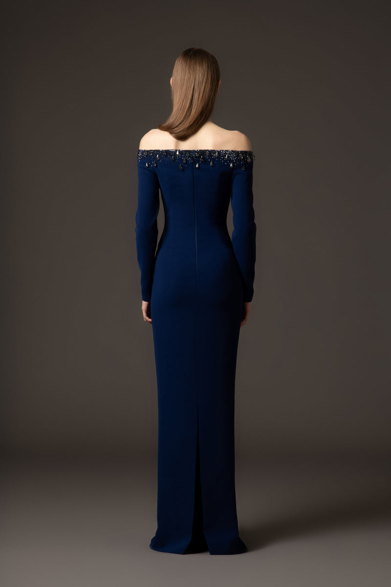 Structured blue crêpe dress with embroidery.