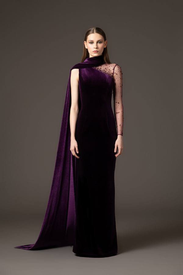 Velvet burgundy dress with crystal embroidery paired with a one-sided cape