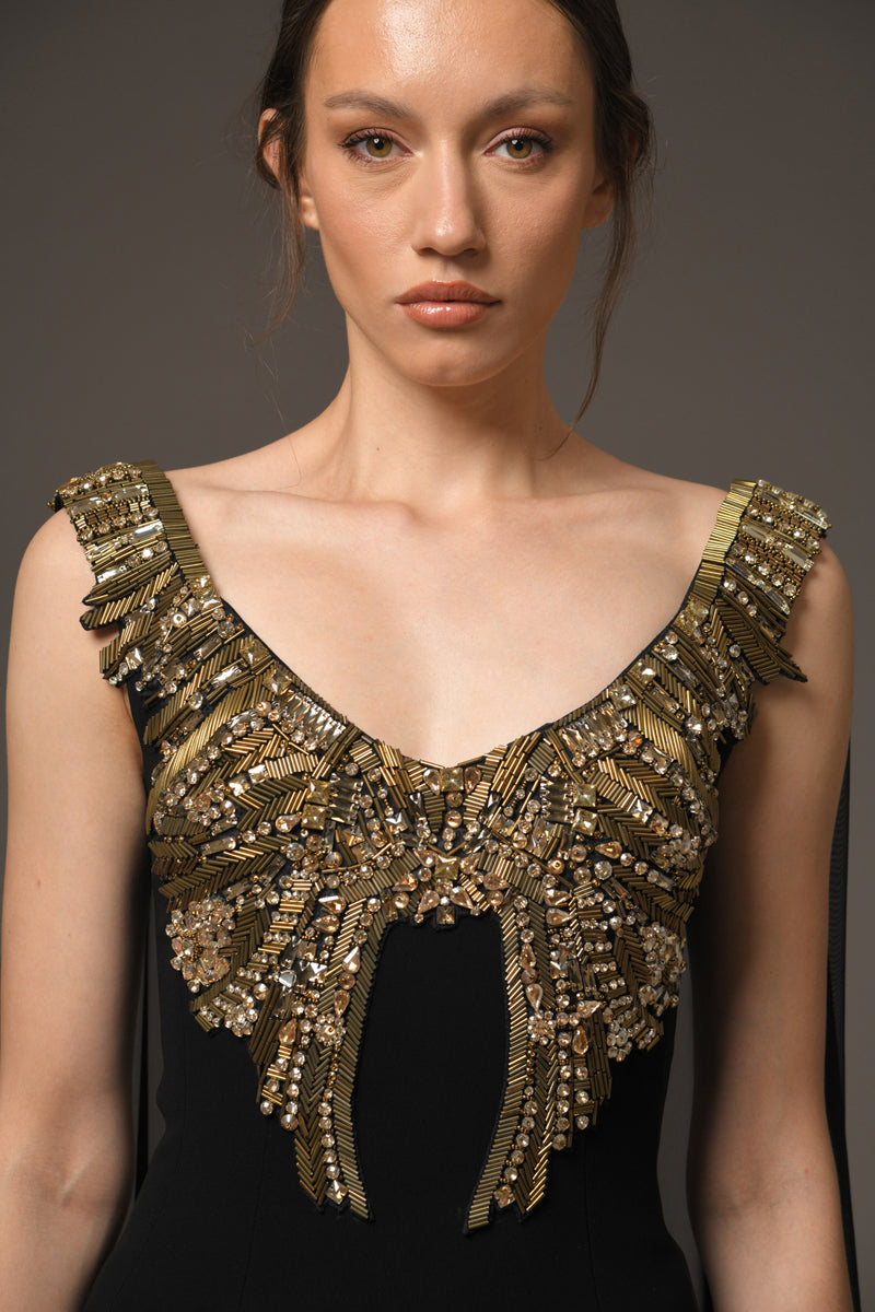 Black crêpe dress with embroidery and chiffon cape