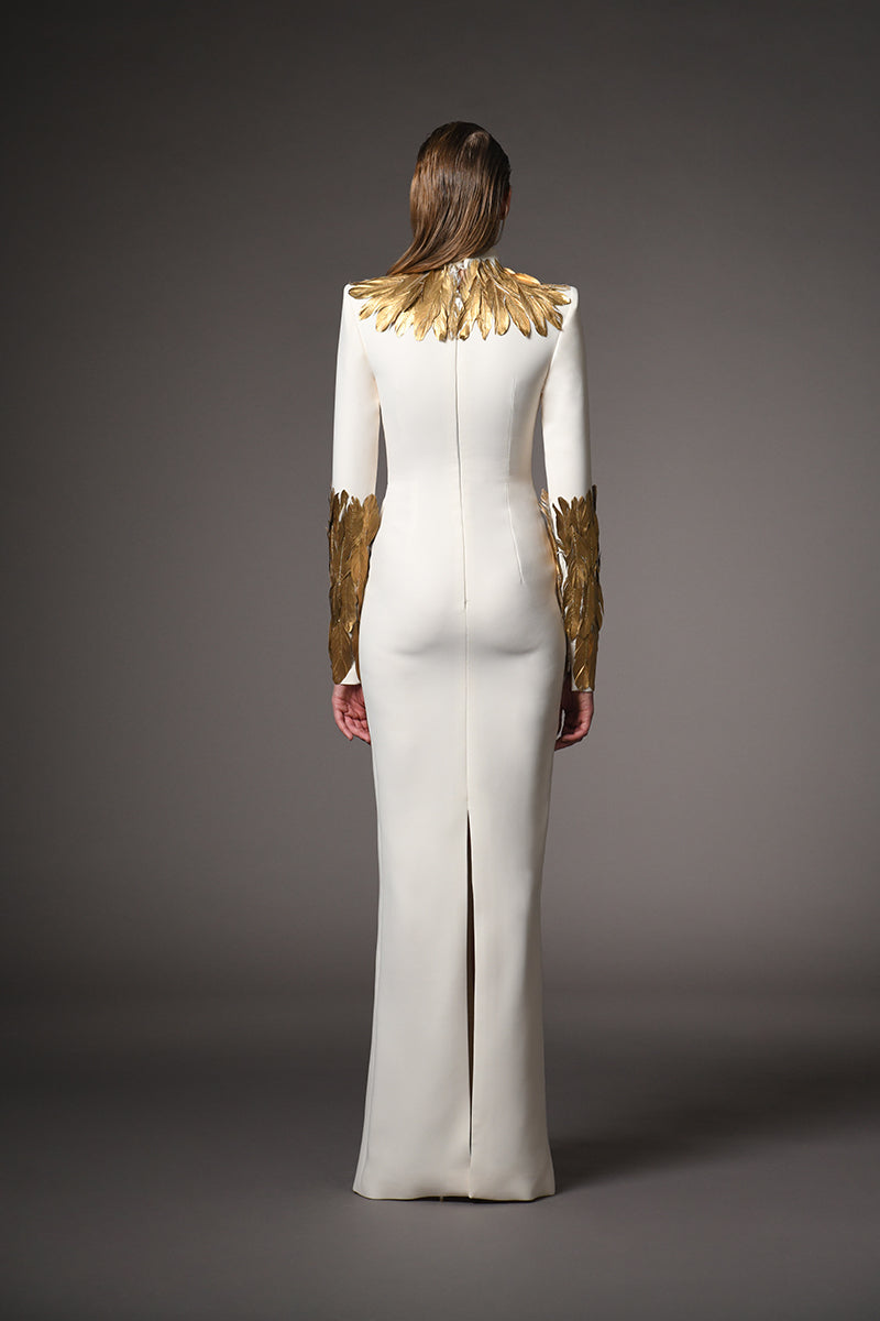 Ivory white dress with gold feathers on the neckline and sleeves