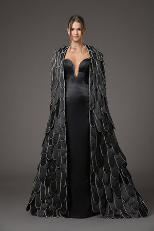 Black silk scuba dress featuring a cape Black silk scuba dress featuring a cape