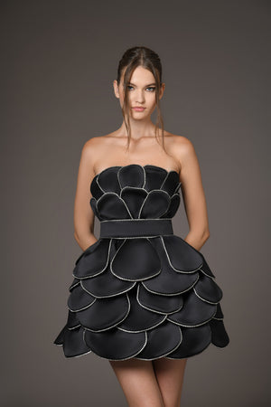 Black silk scuba mini dress adorned with handcrafted plumes in scuba and crystals