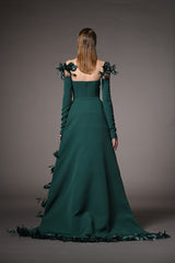 Green jumpsuit with reversible feathers overskirt.