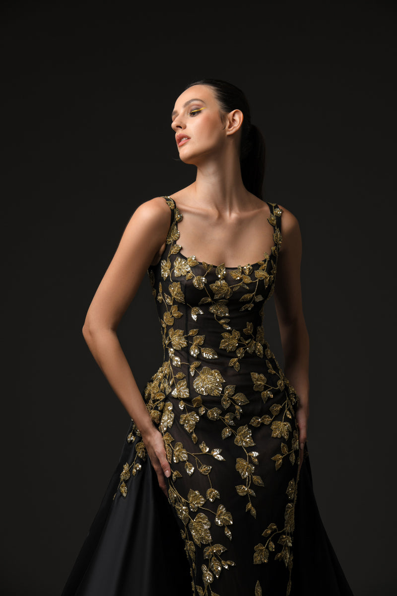 Black tulle dress with gold leaf embroidery close up