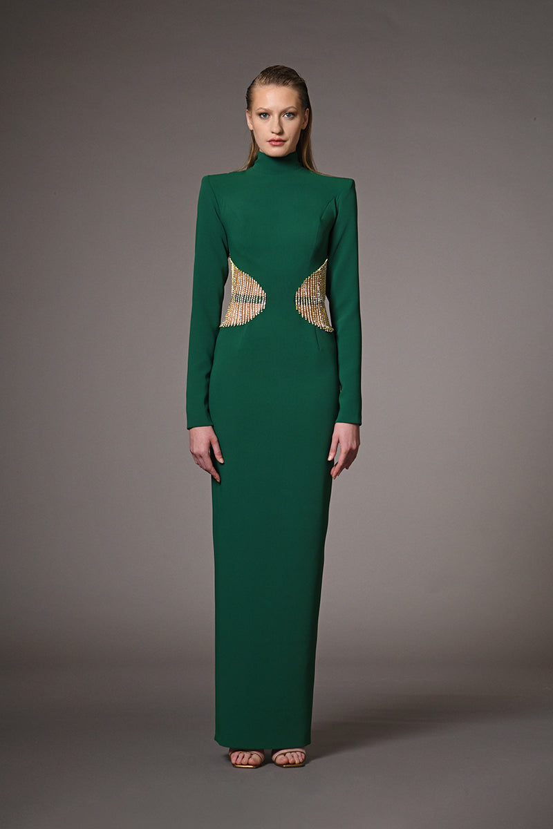 Green dress featuring rhinestone fringes