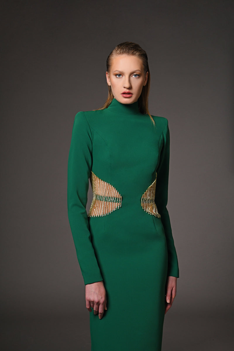 Green dress featuring rhinestone fringes