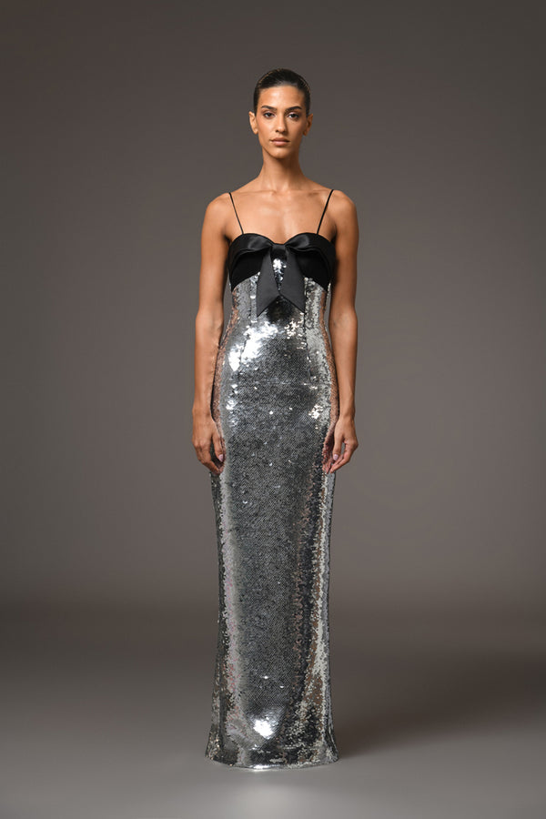 Grey sequined dress with a bow detailing on the bust