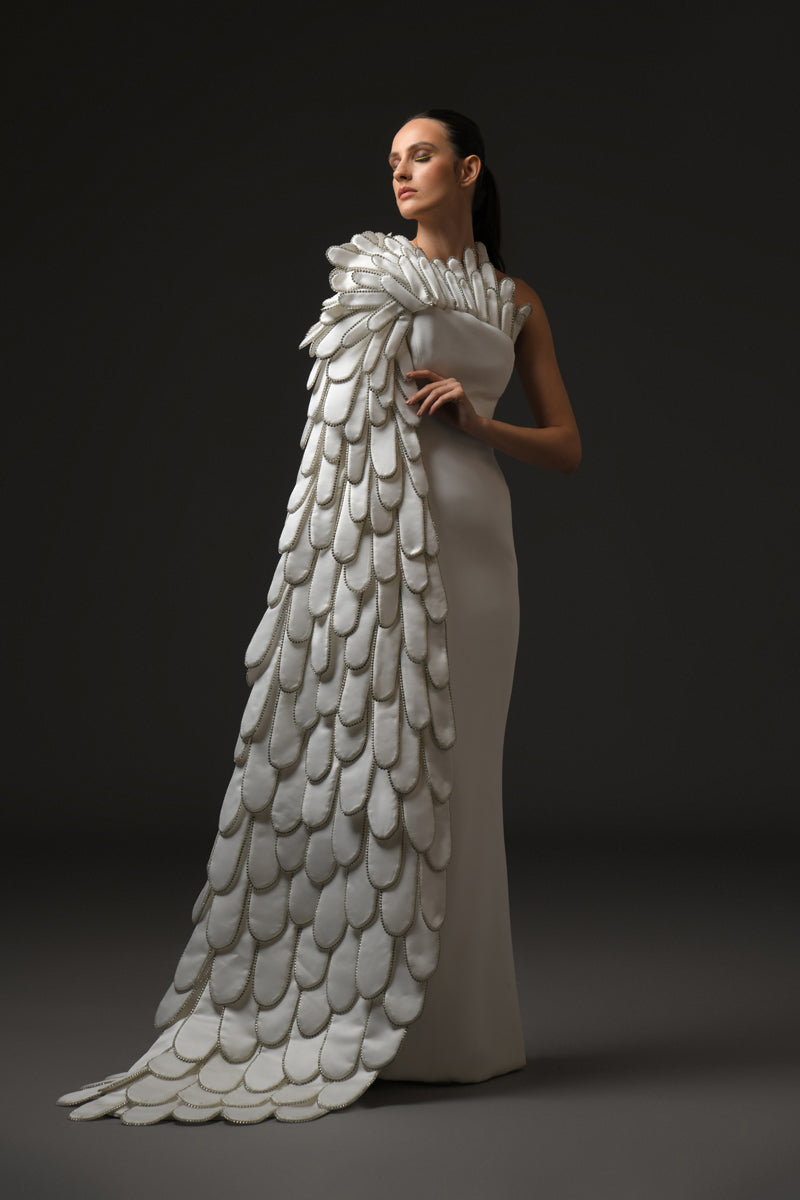 White silk scuba dress with 3d hand crafted plumes on the side 