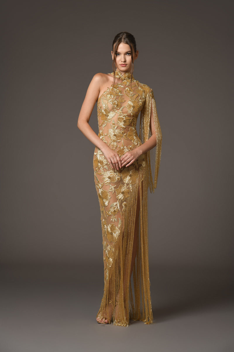 Assymetrical dress with floral patterns embroidered with gold beads