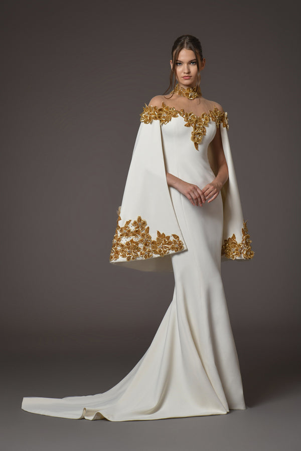 white silk crepe dress with golden flower embroidery on cape clear shoulders