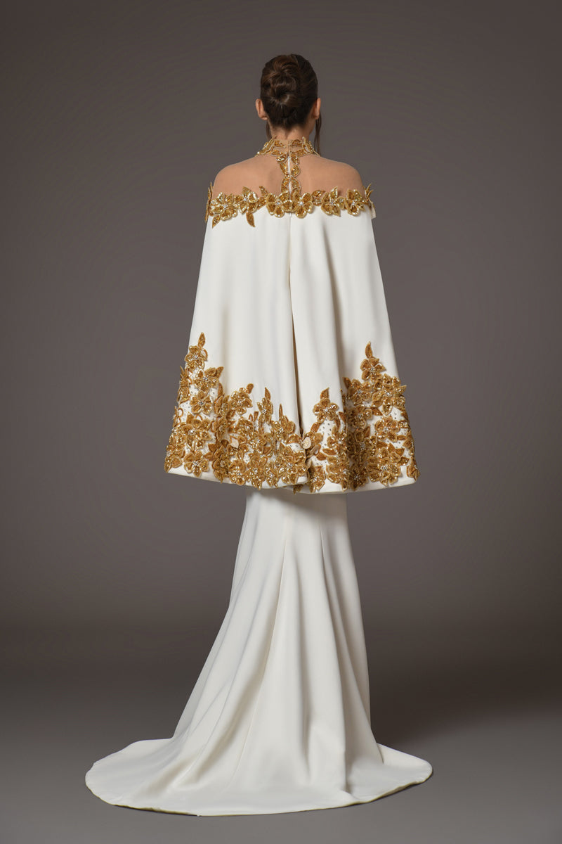 white silk crepe dress with golden flower embroidery on cape back view clear shoulders