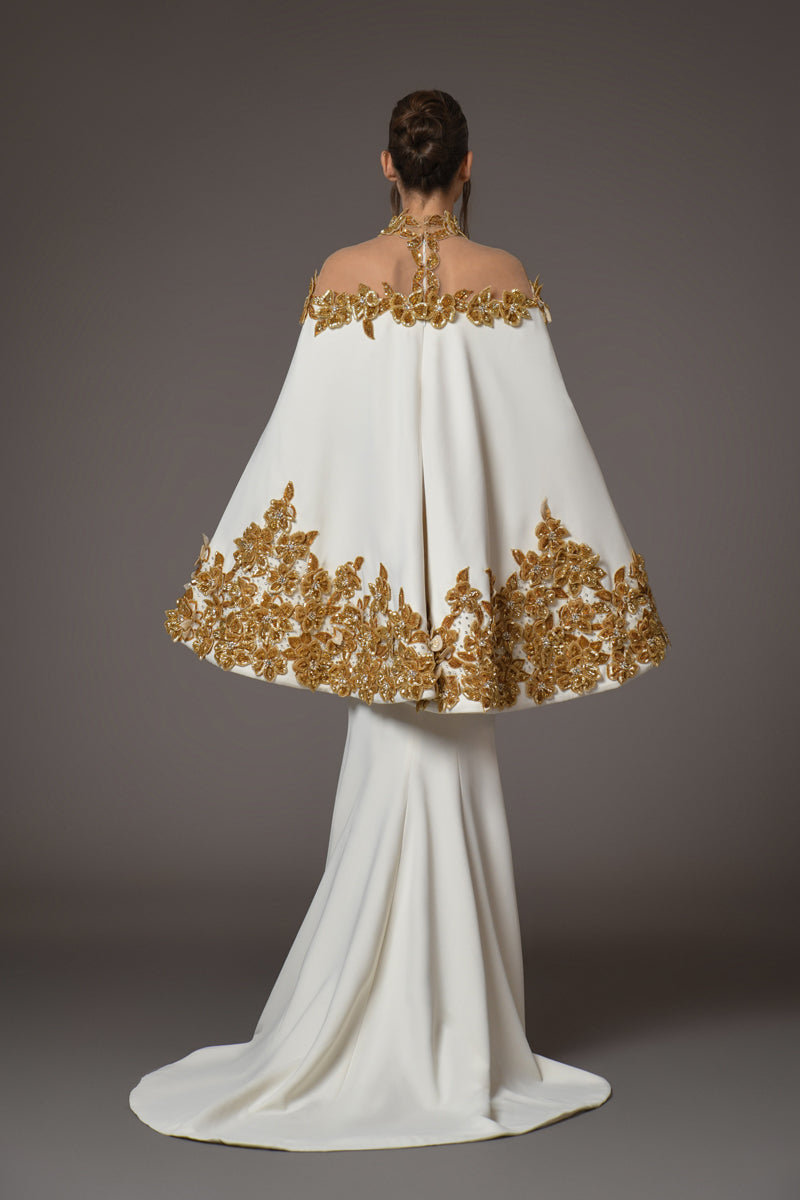 white silk crepe dress with golden flower embroidery on cape back view with train