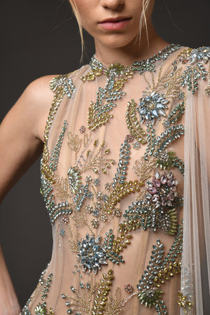 nude tulle dress with flower embroidery close up