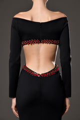 Black jersey dress featuring red crystal embroidery on the waist cut-out and open back
