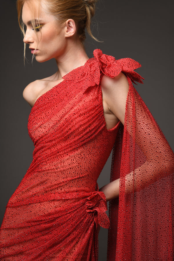 Draped asymmetrical tulle gown with ruby red crystals and close up on flower detailing