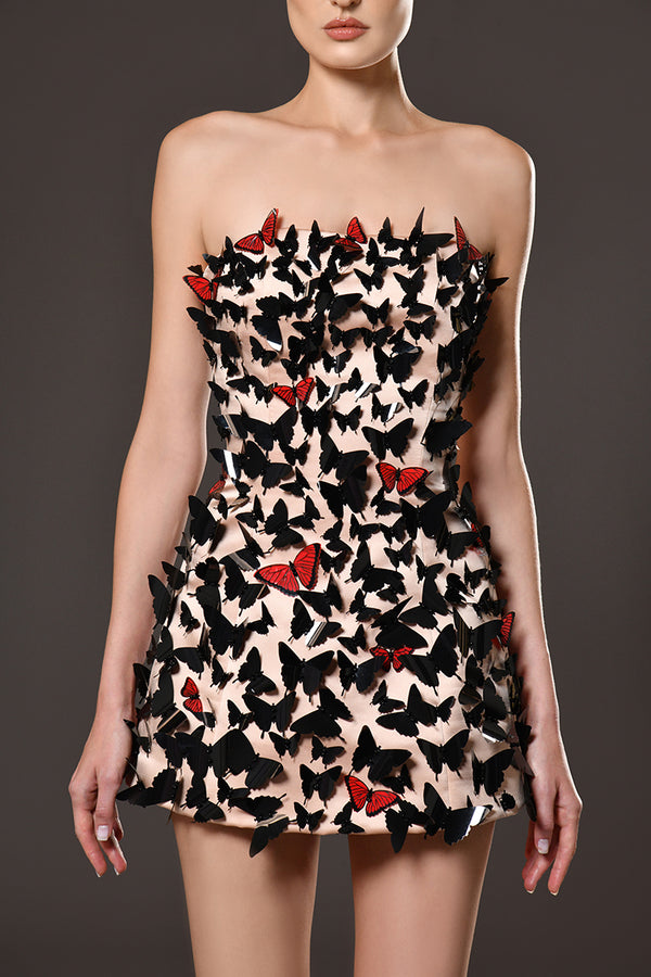 Short peach dress with hand stitched laser cut butterflies