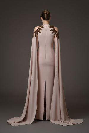 Nude crêpe dress with embroidery paired with cape sleeves