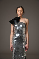 Grey sequined asymmetric dress with a bow detailing