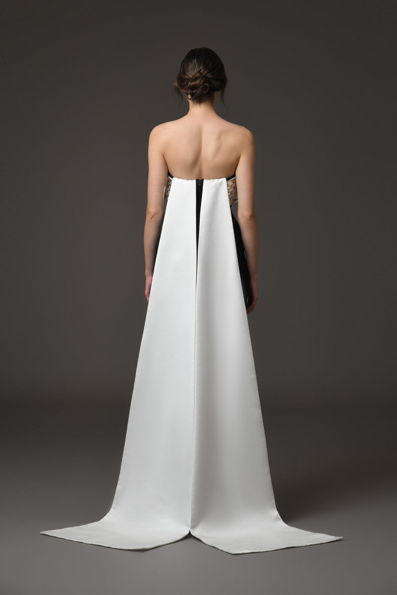 Corseted black crêpe dress with baguette embroidery featuring a white silk satin radzimir train