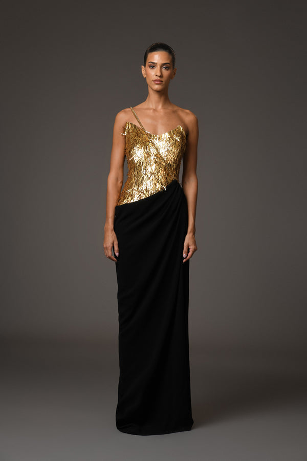 Black corseted crêpe dress with gold embroidery