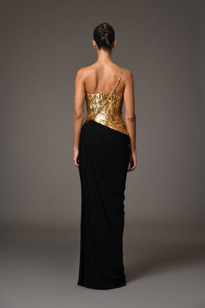 Black corseted crêpe dress with gold embroidery